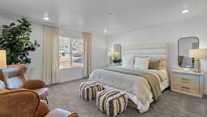 Carpeted bedroom featuring baseboards and recessed lighting