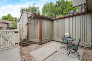 View of patio / terrace featuring a gate