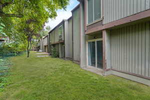 View of grassy yard featuring a residential view