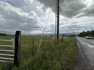 View of asphalt road featuring a view of countryside