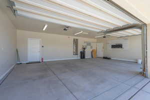 Garage featuring baseboards