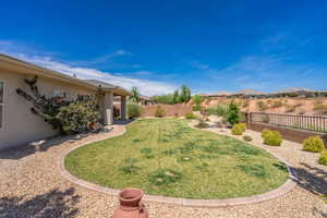 View of fenced backyard