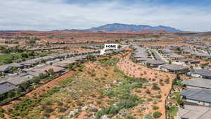 Aerial view of residential area with mountains