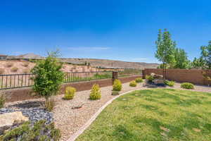View of fenced backyard