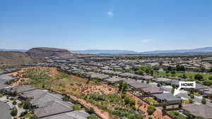 Aerial view of residential area with a mountain backdrop