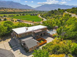 Overview of rural landscape featuring a mountainous background