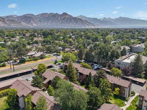 Aerial view of residential area featuring a mountain backdrop