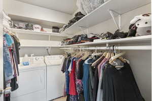 Laundry area featuring independent washer and dryer