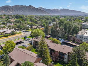 Aerial view of residential area featuring mountains