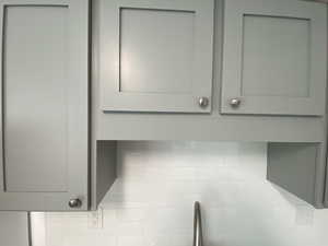 Kitchen view of gray cabinetry