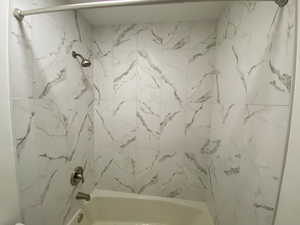 Full bathroom featuring shower / bath combination