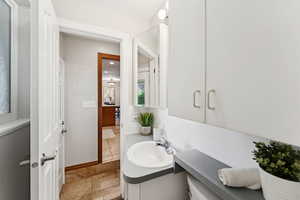 Bathroom with vanity and tile patterned flooring