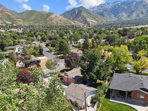 Aerial view of residential area featuring a mountain backdrop