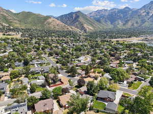 Aerial view of residential area with a mountainous background