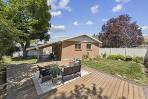 Wooden deck with an outdoor hangout area