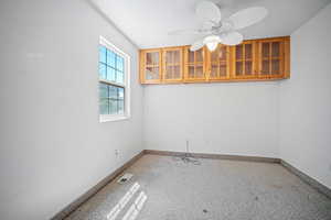 2nd bedroom with ceiling fan.