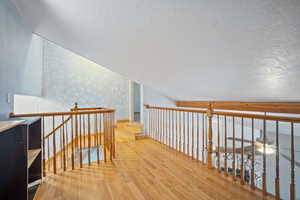 Loft could be den or library.  Removeable bookshelves.