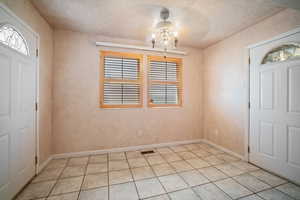Dine in Kitchen, opens to the garage on one end and the backyard on the other side.