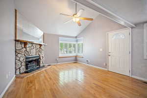 Wood flooring, Rock Fireplace, Window Seat, Shutters, Fan and Tall Vaults