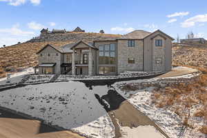 View of front facade with stone siding