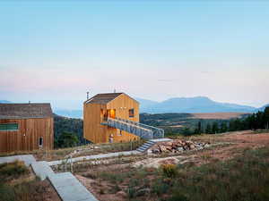 View of outbuilding with a mountain view