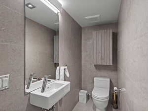 Bathroom with tile walls