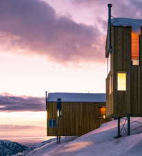 View of property exterior at dusk