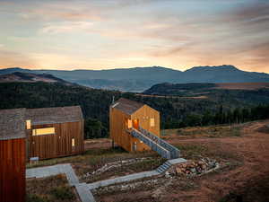 Mountain view featuring a heavily wooded area