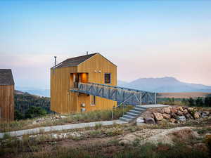 Exterior space featuring a mountain view