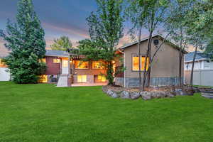 Back of property featuring a patio and stucco siding