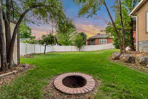 View of fenced backyard