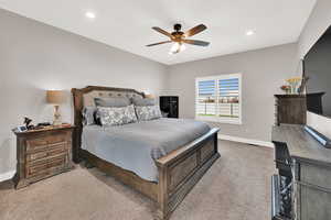 Bedroom featuring carpet floors, recessed lighting, and ceiling fan