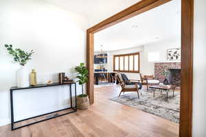 Hallway featuring wood finished floors