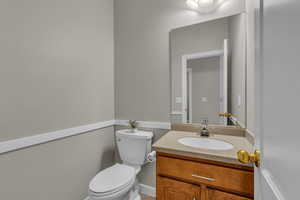 Half bath off mudroom, kitchen & garage entry