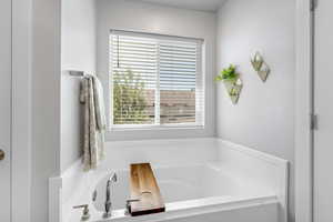 Full bath featuring a garden tub