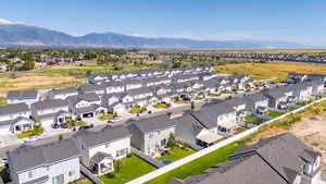Aerial view of residential area with a mountain backdrop
