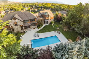 View from above of property featuring a pool area