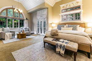 Bedroom with a chandelier, carpet floors, access to outside, high vaulted ceiling, and wood ceiling