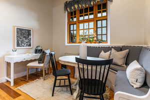 Dining space featuring wood finished floors and breakfast area