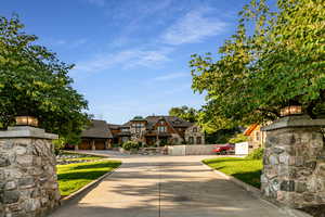 Tudor-style house featuring stone siding