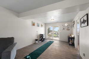 Sitting room with wood finished floors