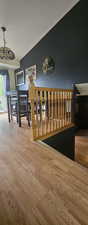 Staircase with wood finished floors