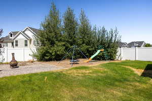 View of yard featuring a playground