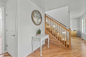 Wooden Staircase with refinished hardwood floors.