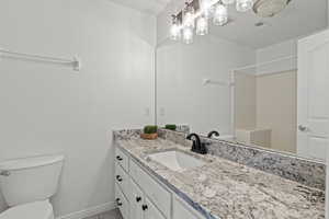 2nd floor Bathroom with new paint, granite countertops, new sink, new fixtures.
