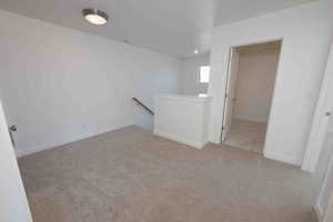 Unfurnished room featuring carpet floors and recessed lighting