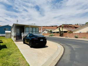 View of front facade with a residential view