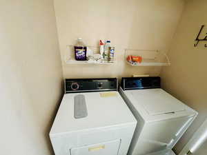 Washroom with washing machine and dryer