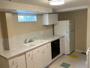 2nd Full kitchen featuring refrigerator & dishwasher