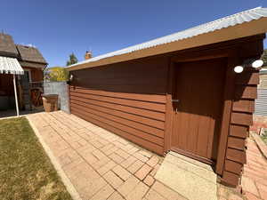 Side of garage showing workshop entry